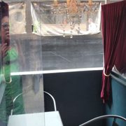 Photo of Charlie Was a Sinner - Philadelphia, PA, United States. Outdoor seating with chandelier