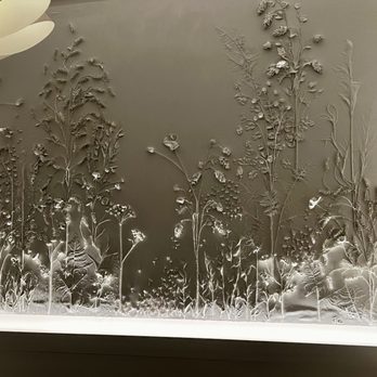 Perle Mesta - Etched wall of all the herbs Chef Black uses in his ingredients - New American Near Me - Oklahoma City, Oklahoma Perle Mesta - Etched wall of all the herbs Chef Black uses in his ingredients - New American Near Me - Oklahoma City, Oklahoma