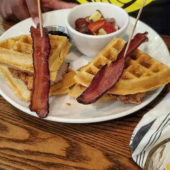 44 Mills Kitchen + Tap - Chicken and waffle sandwich with maple bourbon syrup - New American Near Me - Concord, North Carolina
