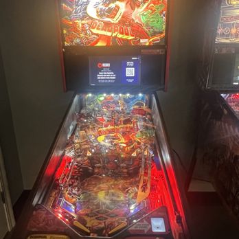 Get Axed - Deadpool pin ball machine - Axe Throwing Near Me - Roseville, California