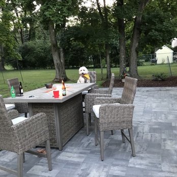 Gardenin' Angels - Our dog enjoying summer patio living!! - Landscaping Near Me - Easton, Massachusetts