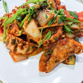 Momo House - Chili Momo (dumplings in spicy chili tomato sauce) - Himalayan/Nepalese Near Me - Houston, Texas Momo House - Chili Momo (dumplings in spicy chili tomato sauce) - Himalayan/Nepalese Near Me - Houston, Texas