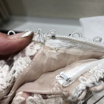 Le Marriage Couture - Note the missing eye part of the hook and eye clasp. Clearly this is not a new dress and has been used/worn before. - Bridal Near Me - Los Angeles, California Le Marriage Couture - Note the missing eye part of the hook and eye clasp. Clearly this is not a new dress and has been used/worn before. - Bridal Near Me - Los Angeles, California