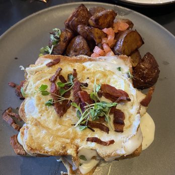 Tutu Lounge - Tutu's french toast. Savory french toast, with mornay sauce, runny egg, bacon, and the best breakfast potatoes - Breakfast & Brunch Near Me - San Rafael, California