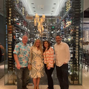 Mahogany Prime Steakhouse - Our group in front of the wine cellar - Steakhouses Near Me - Tulsa, Oklahoma Mahogany Prime Steakhouse - Our group in front of the wine cellar - Steakhouses Near Me - Tulsa, Oklahoma