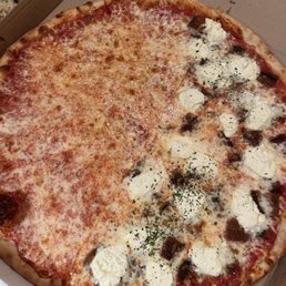 Half cheese half eggplant parm pizza Half cheese half eggplant parm pizza