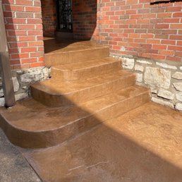Removed old steps that had collapsed away from the porch and created something new. Beautiful!
