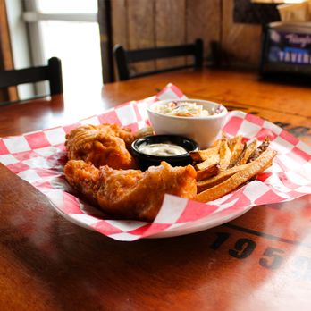 Triangle Tavern - Beer Battered Salmon Fish and Chips - Hand dipped beer battered salmon with tartar sauce. Served with coleslaw and hand-cut home fries - Pubs Near Me - Longview, Washington Triangle Tavern - Beer Battered Salmon Fish and Chips - Hand dipped beer battered salmon with tartar sauce. Served with coleslaw and hand-cut home fries - Pubs Near Me - Longview, Washington