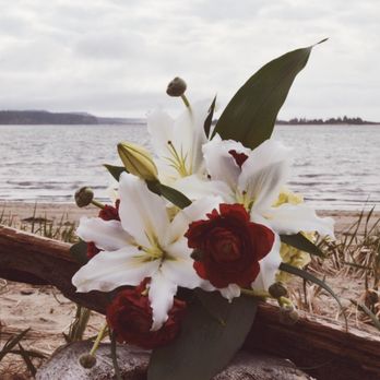 Fisher's Flowers - Bridal bouquet with Lilies and Ranunculus - Floral Designers Near Me