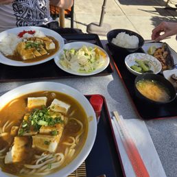 I had tofu curry udon, bottom left, my bro had tofu curry with rice and a salad, and my mom had 1 of the specials I had tofu curry udon, bottom left, my bro had tofu curry with rice and a salad, and my mom had 1 of the specials