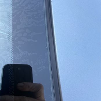 Speedy Auto Tint - This is the driver side front windshield protection cut unevenly with a V shaped notch right above the driver side and noticeable peeling. - Car Window Tinting Near Me - Bellflower, California Speedy Auto Tint - This is the driver side front windshield protection cut unevenly with a V shaped notch right above the driver side and noticeable peeling. - Car Window Tinting Near Me - Bellflower, California