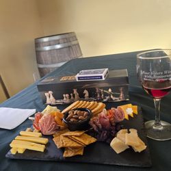 Four Sisters Winery - Wines games and charcuterie board