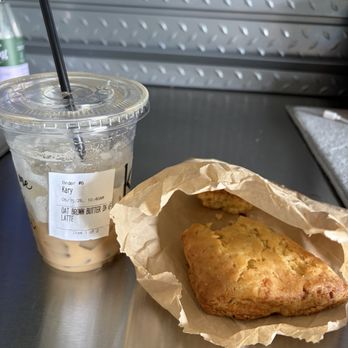 Kiki Kafe - Cup of ice with a splash of latte and a spicy scone. - Coffee & Tea Near Me - Clinton Township, Michigan Kiki Kafe - Cup of ice with a splash of latte and a spicy scone. - Coffee & Tea Near Me - Clinton Township, Michigan