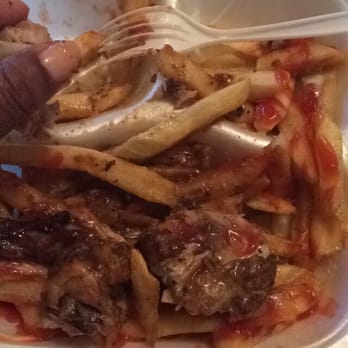 Alvin's Cuisine - Jerk chicken with garlic sauce - Trinidadian Near Me - Orlando, Florida