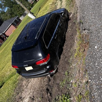 Atomic Towing & Recovery - In the ditch. - Towing Near Me - Lake Charles, Louisiana Atomic Towing & Recovery - In the ditch. - Towing Near Me - Lake Charles, Louisiana