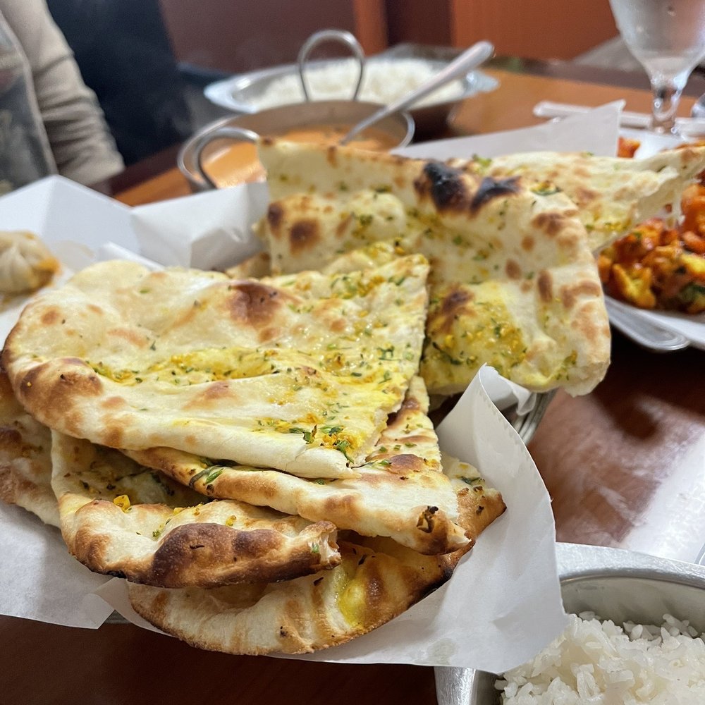 Himalayan Nepali Cuisine - Garlic Naan and Plain Naan - Himalayan/Nepalese Near Me - Cary, North Carolina Himalayan Nepali Cuisine - Garlic Naan and Plain Naan - Himalayan/Nepalese Near Me - Cary, North Carolina