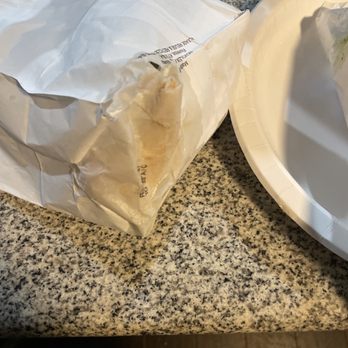 Tom's Jr - a burrito and a glass of water - Burgers Near Me - Compton, California Tom's Jr - a burrito and a glass of water - Burgers Near Me - Compton, California