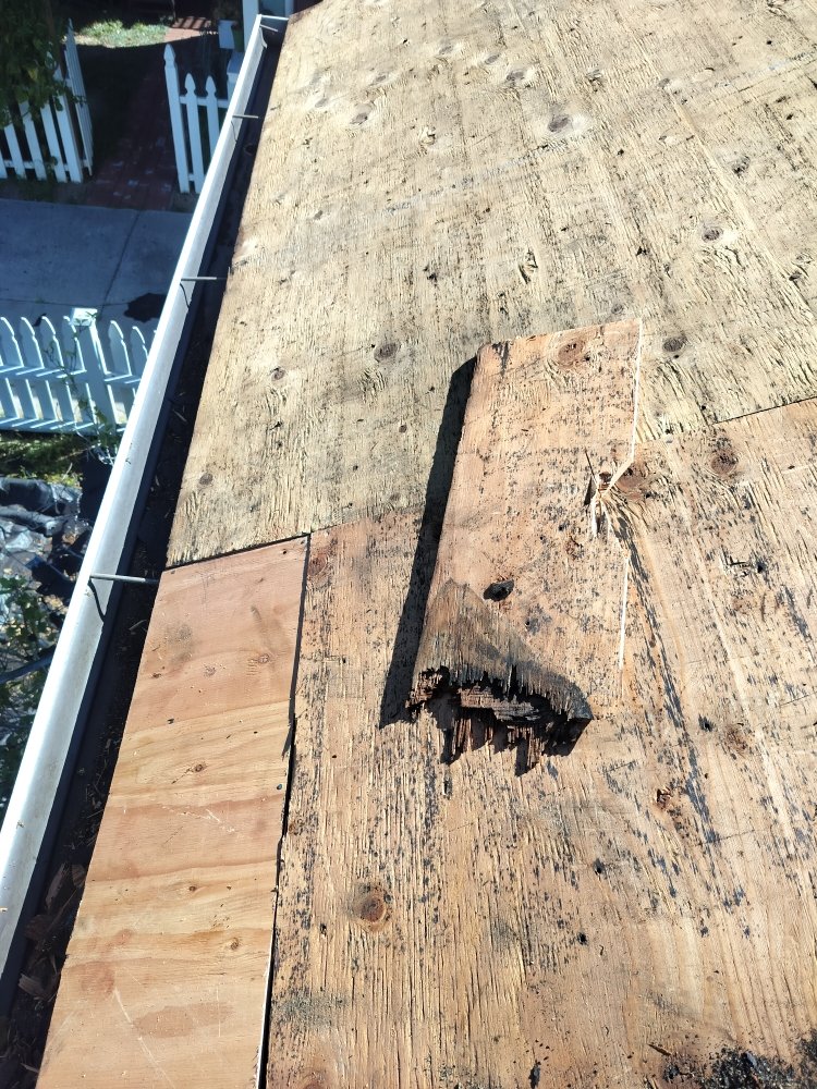 Slide of Pacific Roofing