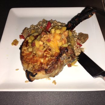 Webb Custom Kitchen - Three Little Pigs - pork chop with apple-bacon relish and andouille farro.  This was a daily special so if you see it, give it a try! - New American Near Me - Gastonia, North Carolina