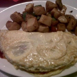 Mexican eggs with hot sauce and potatoes!
