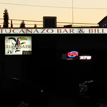 El Tucanazo Bar - cars parked in front of a building - Bars Near Me - Long Beach, California