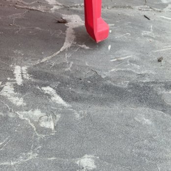 Priority Landscape Construction - Another picture of the uneven patio that a chair can't even sit stable on. - Landscaping Near Me - Omaha, Nebraska