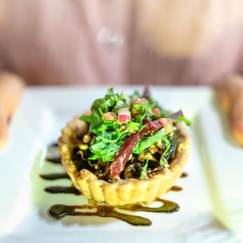 Hukilau Lanai - Swiss Chard & Local Mushroom Tart $12 "Swiss chard, topped with an arugula, red onion & pickled beet salad with basil vinaigrette" - Seafood Near Me - Kapaa, Hawaii