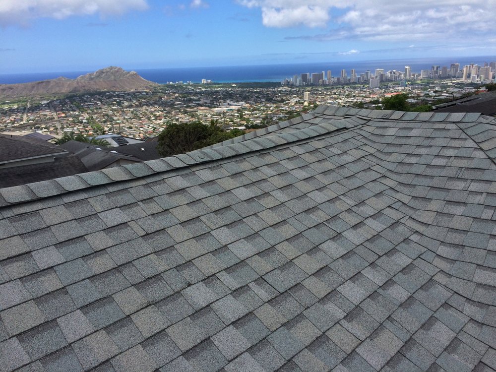 Slide of Surface Shield Roofing Company