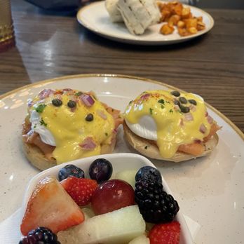 RH House - Smoked salmon Benedict with fruit cup; and chicken and avocado wrap with seasoned potatoes - Seafood Near Me - Rochester Hills, Michigan RH House - Smoked salmon Benedict with fruit cup; and chicken and avocado wrap with seasoned potatoes - Seafood Near Me - Rochester Hills, Michigan