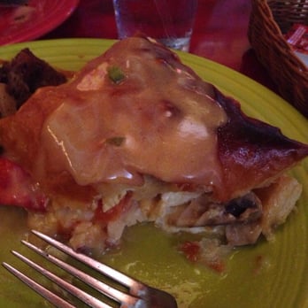 Millie's Diner - Soft scrambled eggs with lobster, bacon, mushrooms, and tomatoes in a puff pastry in hollandaise sauce. Served with potatoes. - New American Near Me - Richmond, Virginia Millie's Diner - Soft scrambled eggs with lobster, bacon, mushrooms, and tomatoes in a puff pastry in hollandaise sauce. Served with potatoes. - New American Near Me - Richmond, Virginia
