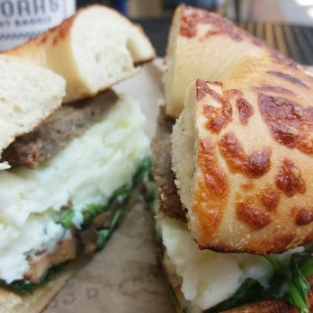 Noah's NY Bagels - Spinach Mushroom and Swiss Egg Bagel on Asiago with 2 egg whites and turkey sausage added. - Bagels Near Me - Burbank, California Noah's NY Bagels - Spinach Mushroom and Swiss Egg Bagel on Asiago with 2 egg whites and turkey sausage added. - Bagels Near Me - Burbank, California
