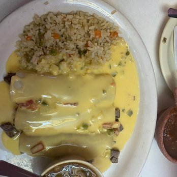 Jardin Del Rey - Beefy fajita enchiladas with queso - Mexican Near Me - Leander, Texas Jardin Del Rey - Beefy fajita enchiladas with queso - Mexican Near Me - Leander, Texas