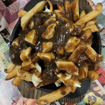 Jimmy Buffett's Margaritaville - Poutine - American Near Me - Niagara Falls, Ontario