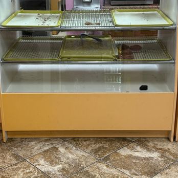 Pflugerville Donuts - Donut case at 5:30 AM when they open at 5. - Donuts Near Me - Pflugerville, Texas