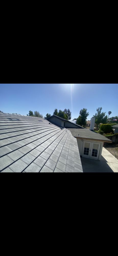 Slide of MG Roofing