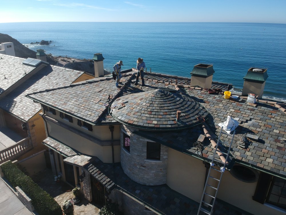 Slide of Coastal Roofing