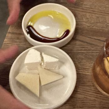 Zaytinya - Cheese and oil with a sweet sauce made to mix with cheese and is part of the 3 cheese plate. A must try! - Greek Near Me - Culver City, California Zaytinya - Cheese and oil with a sweet sauce made to mix with cheese and is part of the 3 cheese plate. A must try! - Greek Near Me - Culver City, California