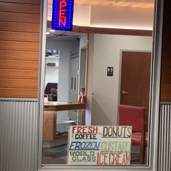 Lisa’s Ice Cream and Donuts! - Front window and handmade sign
