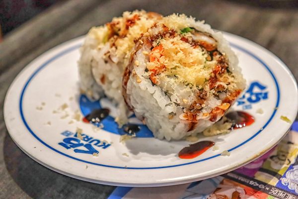 Kura Revolving Sushi Bar by null