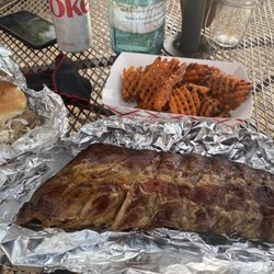Bootleg BBQ - The food is delicious! The full rack of ribs, chicken sandwich and perfectly seasoned seeet potato fries were all fantastic!