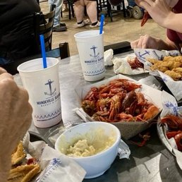 Catfish platter, potato salad, and crawfish Catfish platter, potato salad, and crawfish