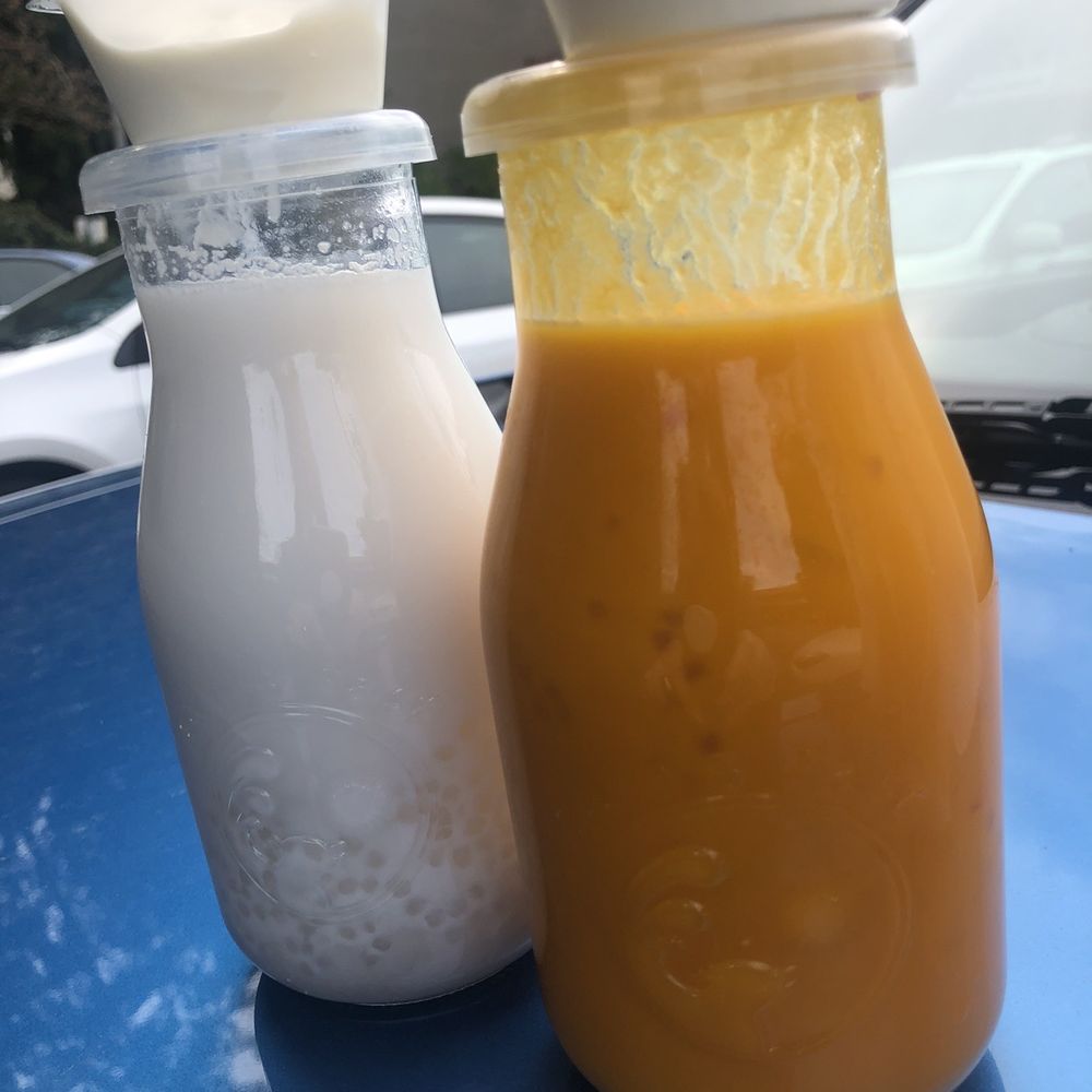 Facing East - This is a Mango Smoothie with grapefruit and sago On left Coconut with taro and sago - Chinese Near Me - Bellevue, Washington Facing East - This is a Mango Smoothie with grapefruit and sago On left Coconut with taro and sago - Chinese Near Me - Bellevue, Washington