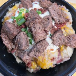 Steak N' Taters Loaded Garlic Butter Taters Topped With Angus Beef Steak Tips Cheese, Bacon, Sour Cream & Chives