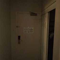 Holiday Inn Danbury-Bethel At I 84 - No light in the closet areas. Darkness. How can I pick clothes or see what's in there. The light you see is from my phone
