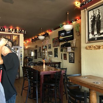 Missouri Breaks Brewing - a man drinking a beer in a bar - Breweries Near Me - Wolf Point, Montana Missouri Breaks Brewing - a man drinking a beer in a bar - Breweries Near Me - Wolf Point, Montana