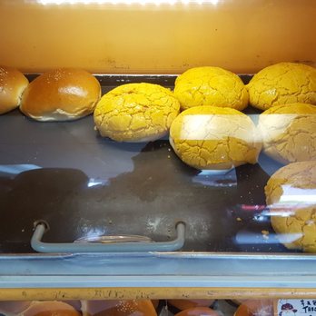 QQ  Bakery - 2018-05-19. QQ Café & Bakery. Madison Heights, MI. L-R: BBQ Pork Bun 3 star. Danish bun with coconut crust. 3 stars. All coconut crust good! - Bakeries Near Me - Madison Heights, Michigan