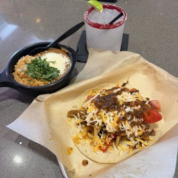 Torchy's Tacos - Fajita taco beans and rice and Cadillac margarita - Tacos Near Me - Denver, Colorado Torchy's Tacos - Fajita taco beans and rice and Cadillac margarita - Tacos Near Me - Denver, Colorado