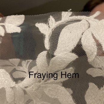 Oak's Tailor - Chopped hem right through appliqué and was frayed - Sewing & Alterations Near Me - Anchorage, Alaska