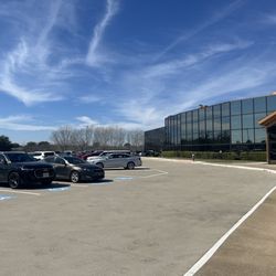 The Chosen Vessel Church - The parking lot, gym and entrance to the children's church on the left side of the church
