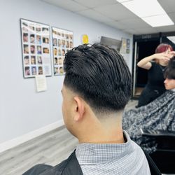 PP Cut 'N' Shave Barber Shop - Mid taper , slick back.